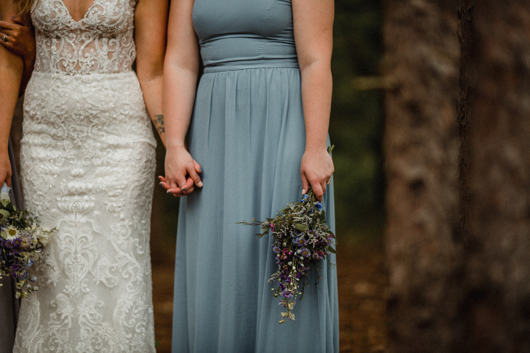 Bridesmaids holding hands
