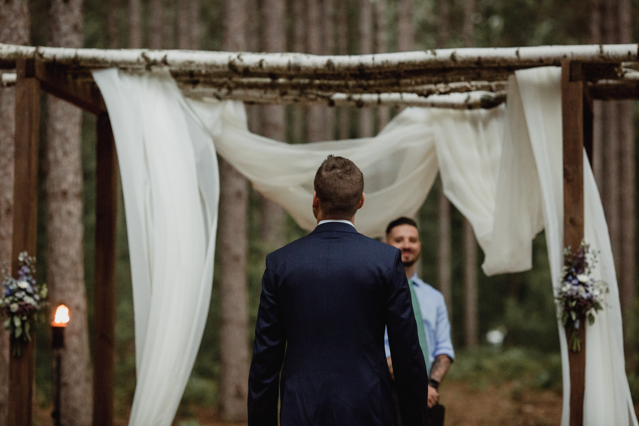 Groom approaching the altar in the forest