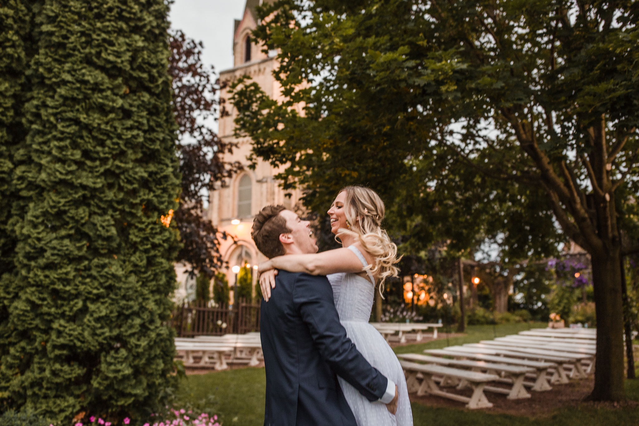 playful bride and groom