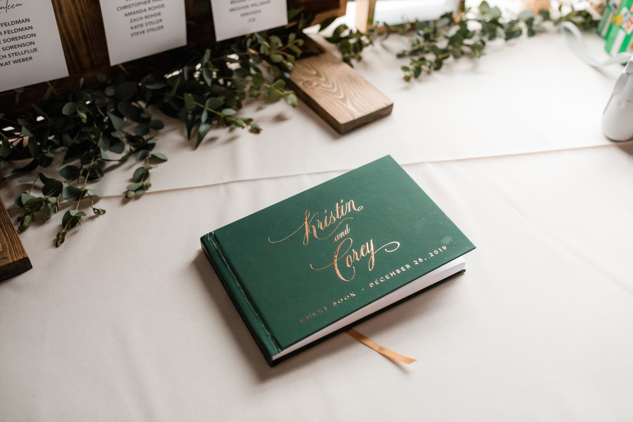 Corey and Kristin had a green and gold guest book at their wedding