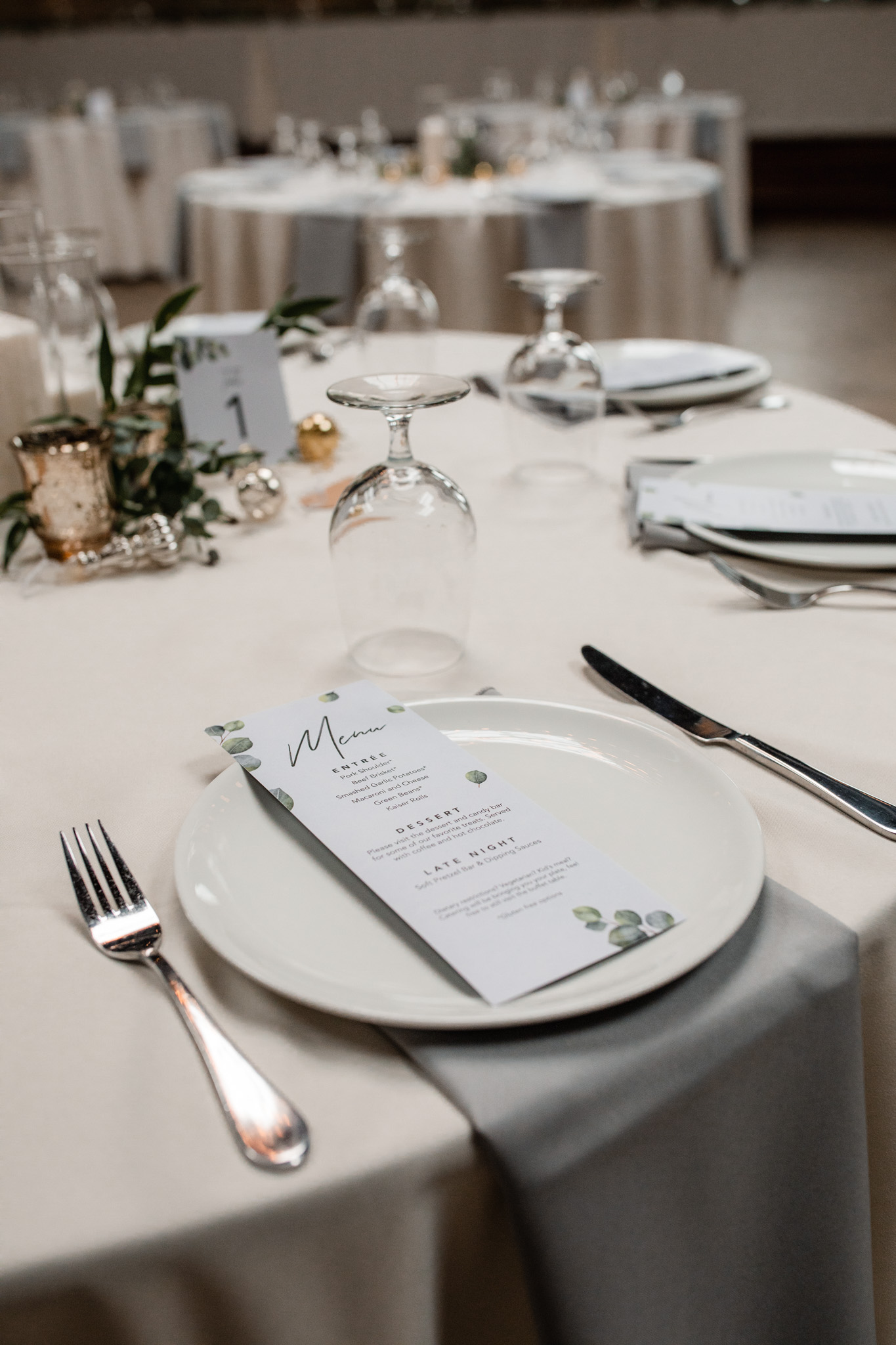 Green and white Christmas wedding table setting at Milwaukee's Ivy House