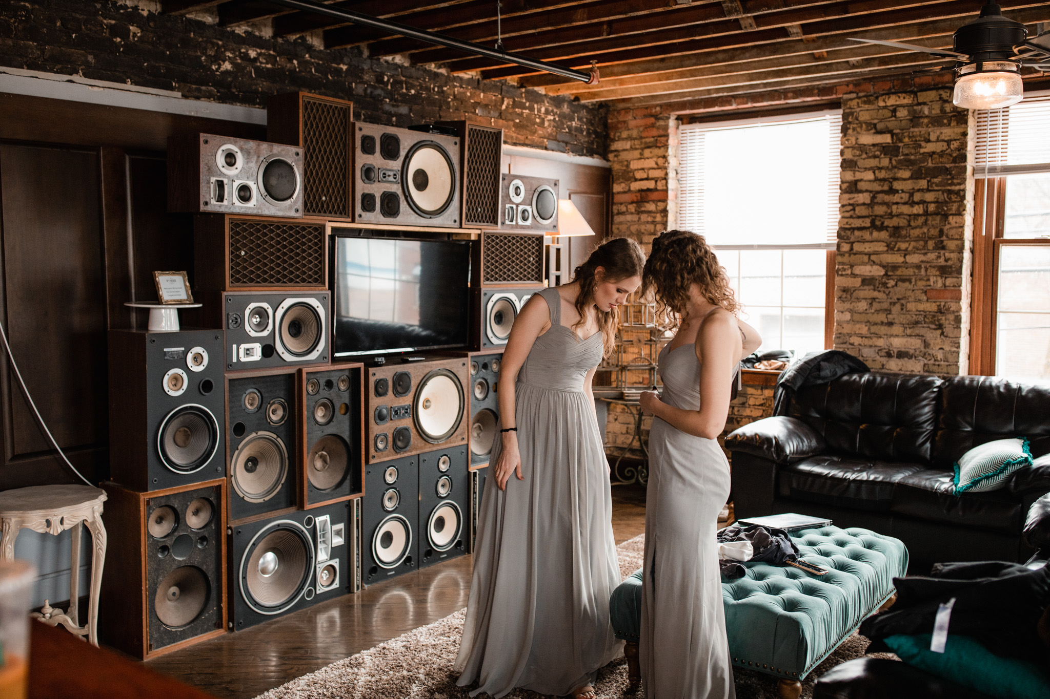 Bridesmaids wearing long lavender dresses   at Milwaukee's Ivy House in the getting ready suite