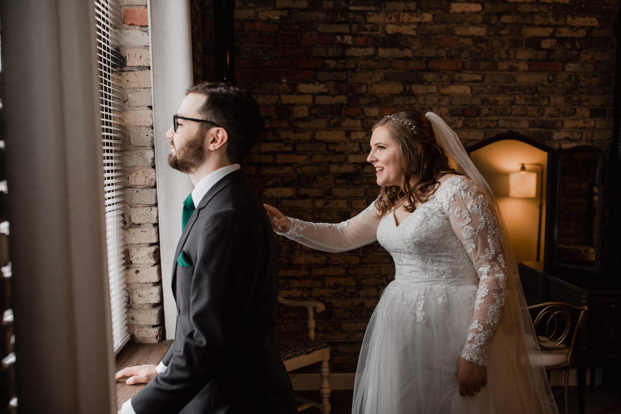 First look between bride and groom at Milwaukee Ivy House