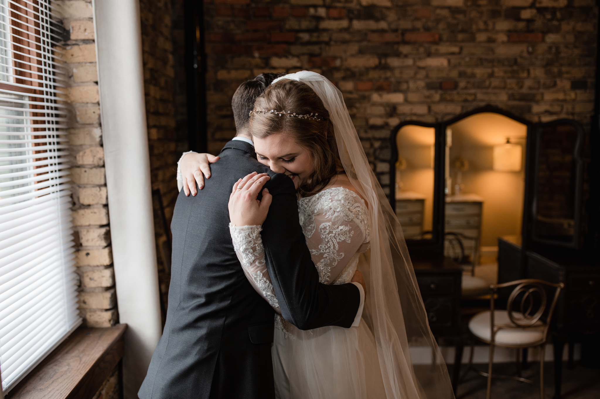 Bride and groom hugging during first look