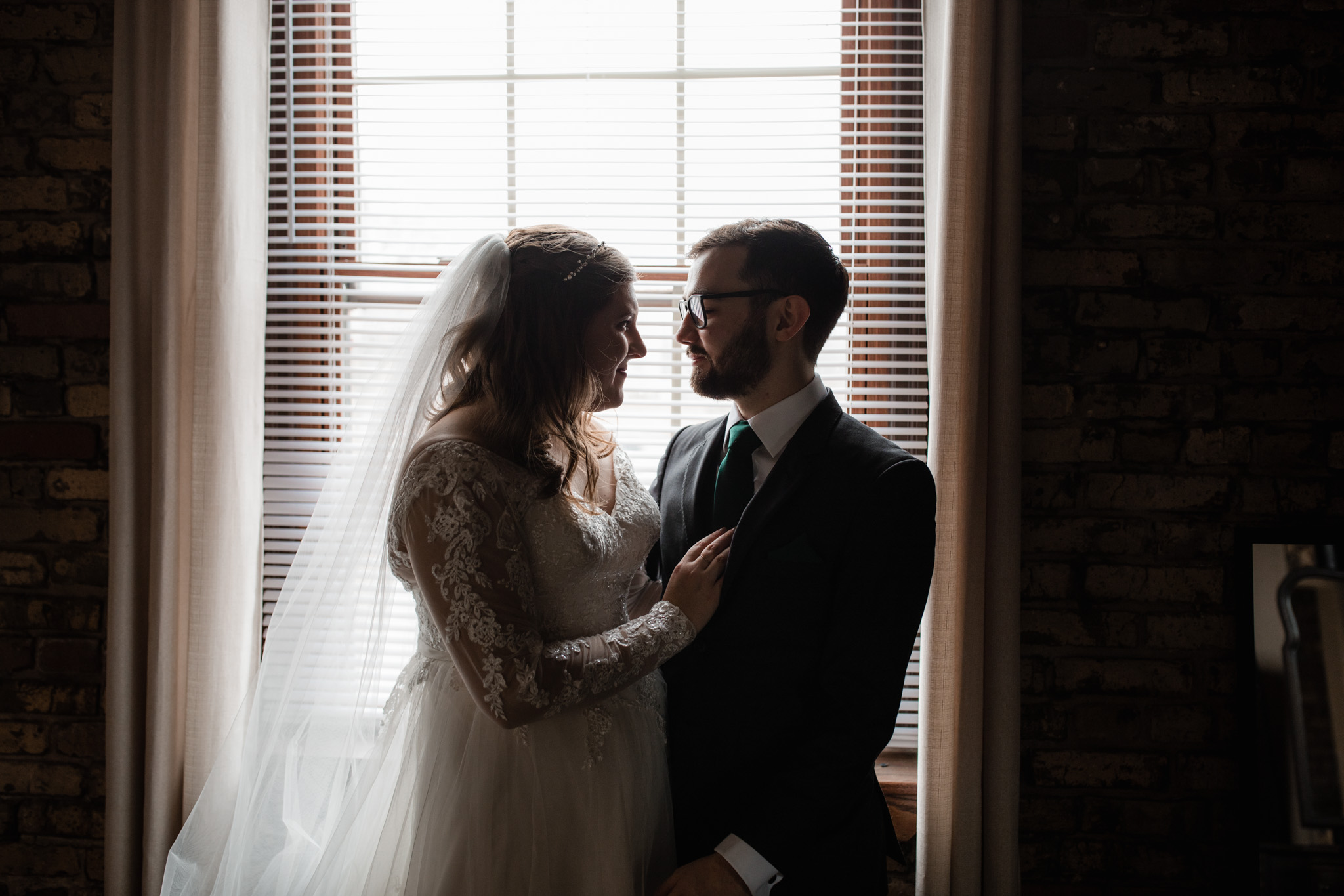 Backlit silhouette wedding picture