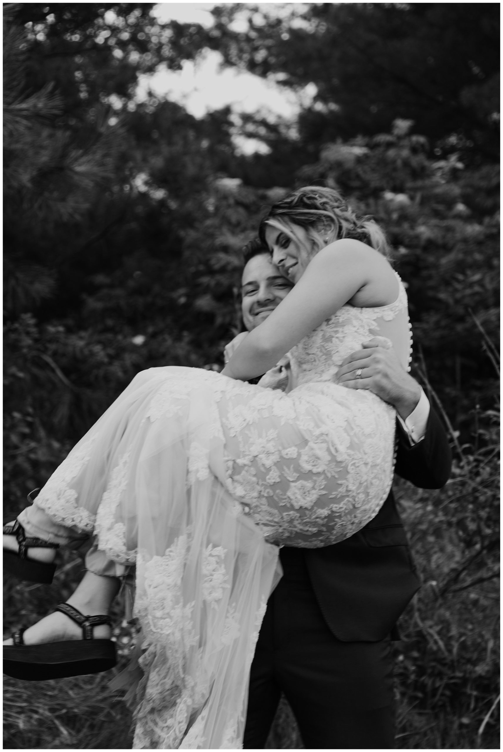 Vogue style wedding picture -  blurry skirt grainy black and white couples portrait Milwauee Wisconsin