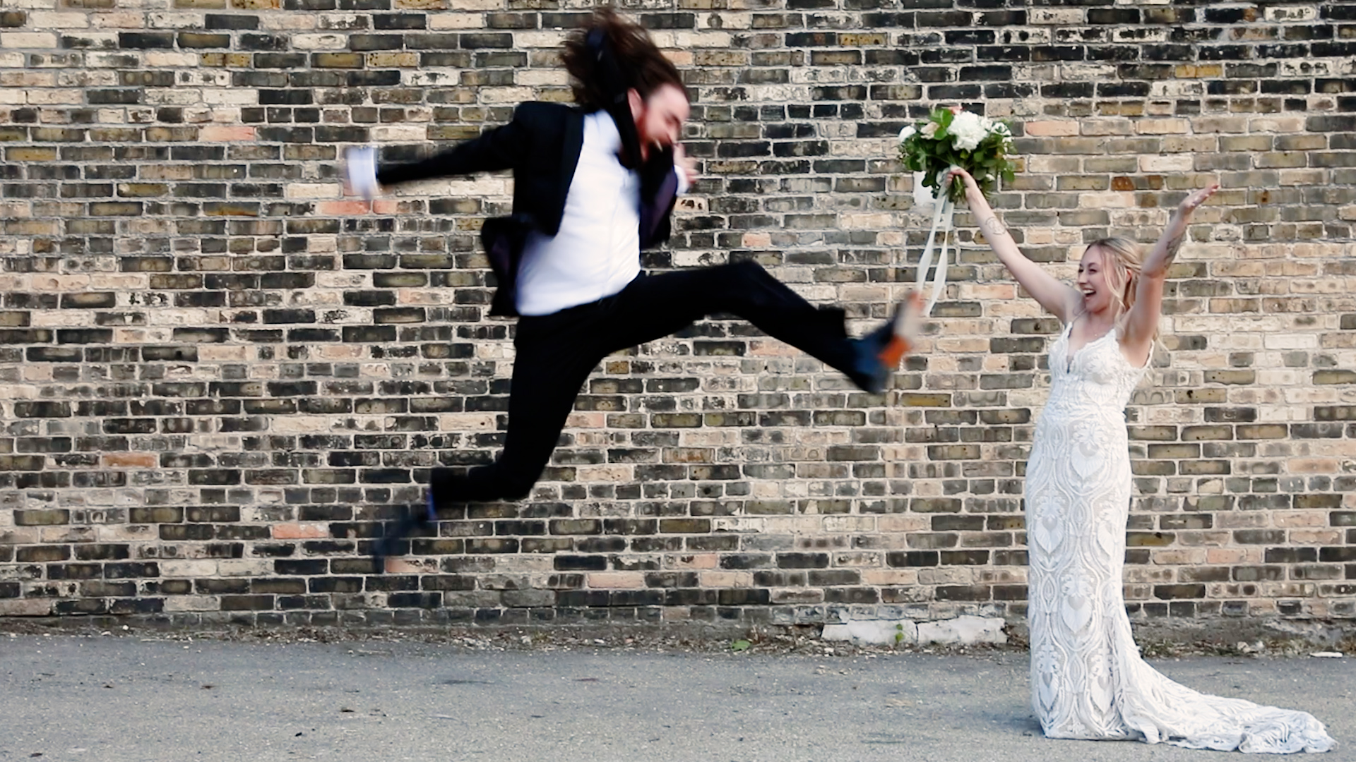 Groom is so excited about his bride that he does splits in the air in an upbeat fashion