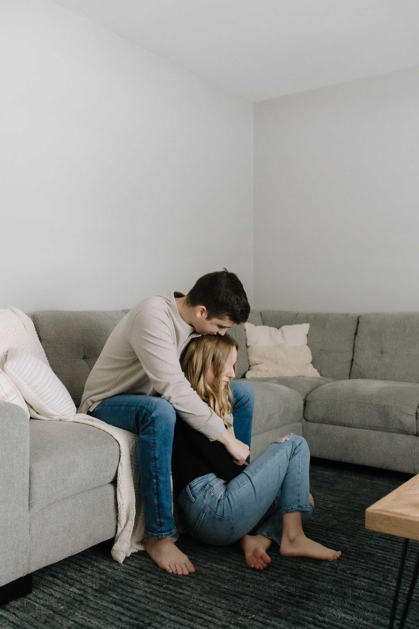 Engagement photography - new home photography - couple sitting in the living room of their new Port Washington house - New home photoshoot
