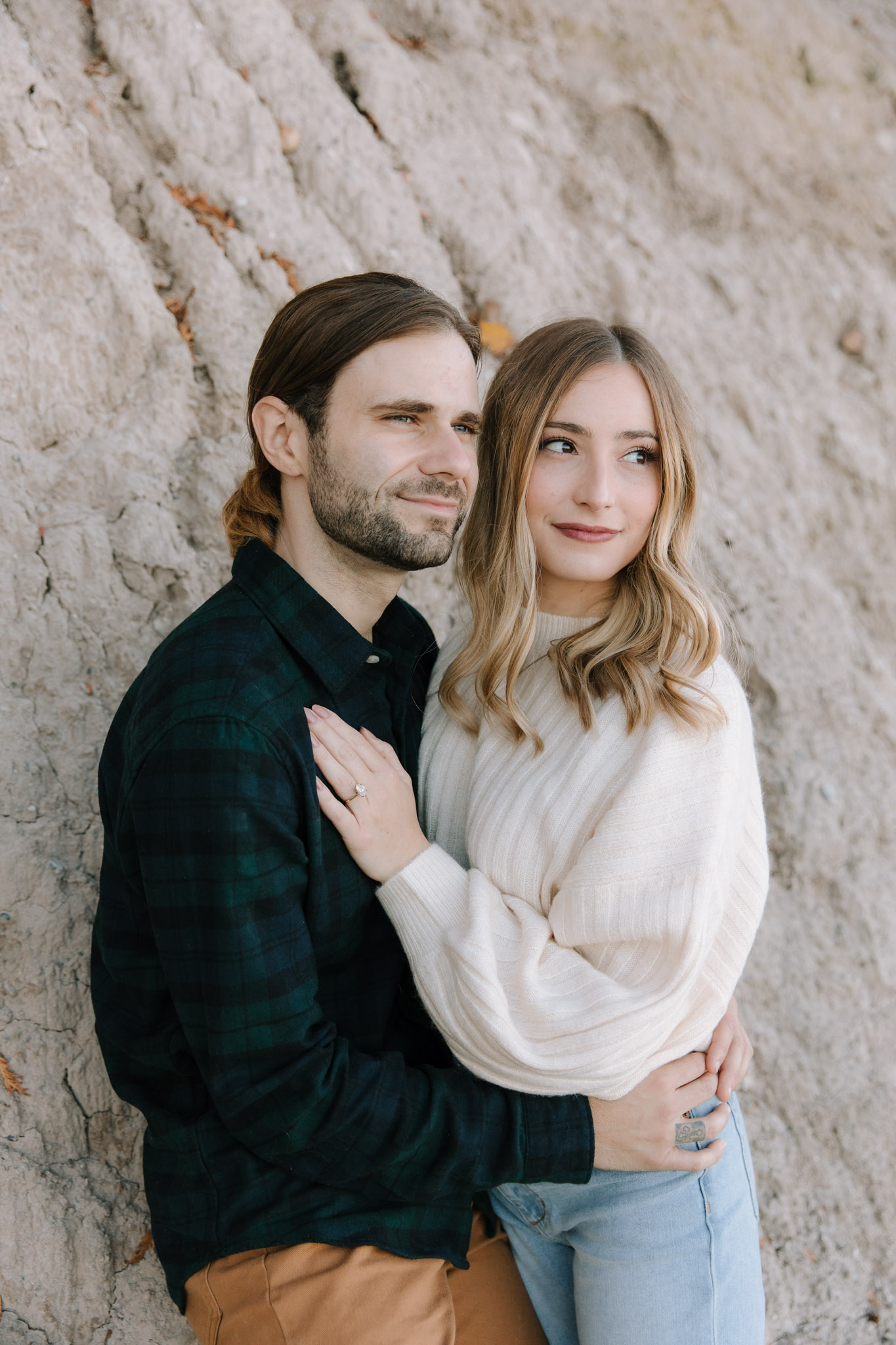 Dramatic engagement photos - couple staring off into the distance