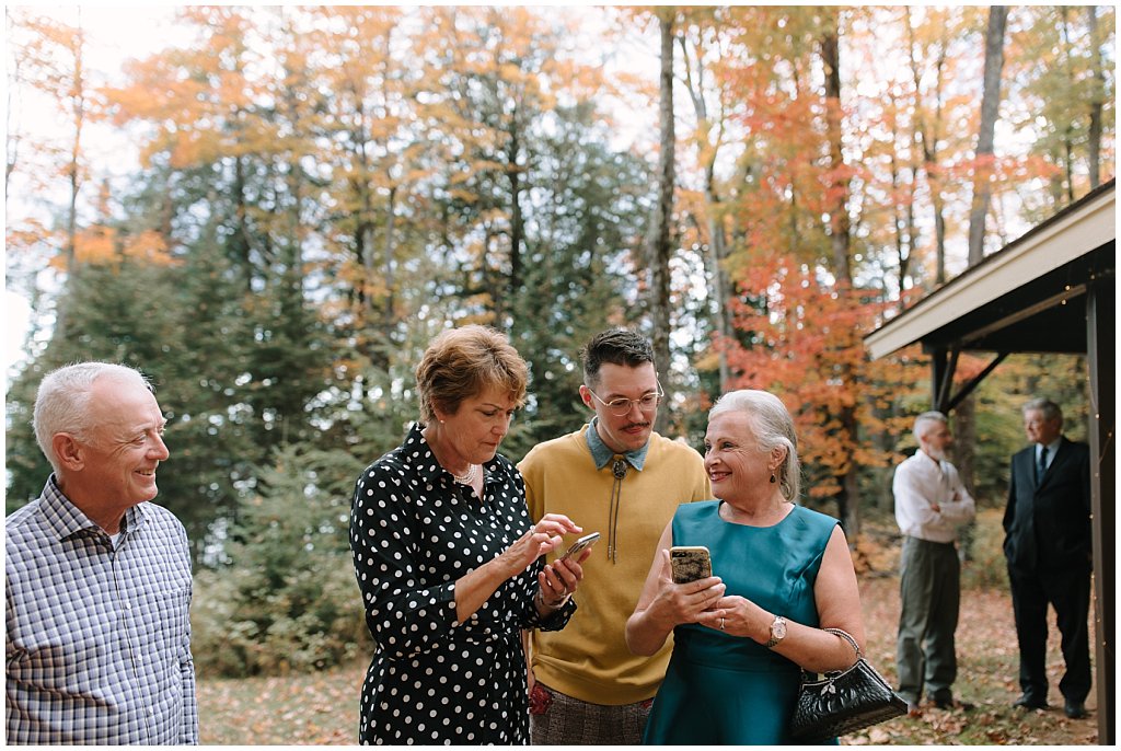 Wedding guests before outdoor fall wedding 
