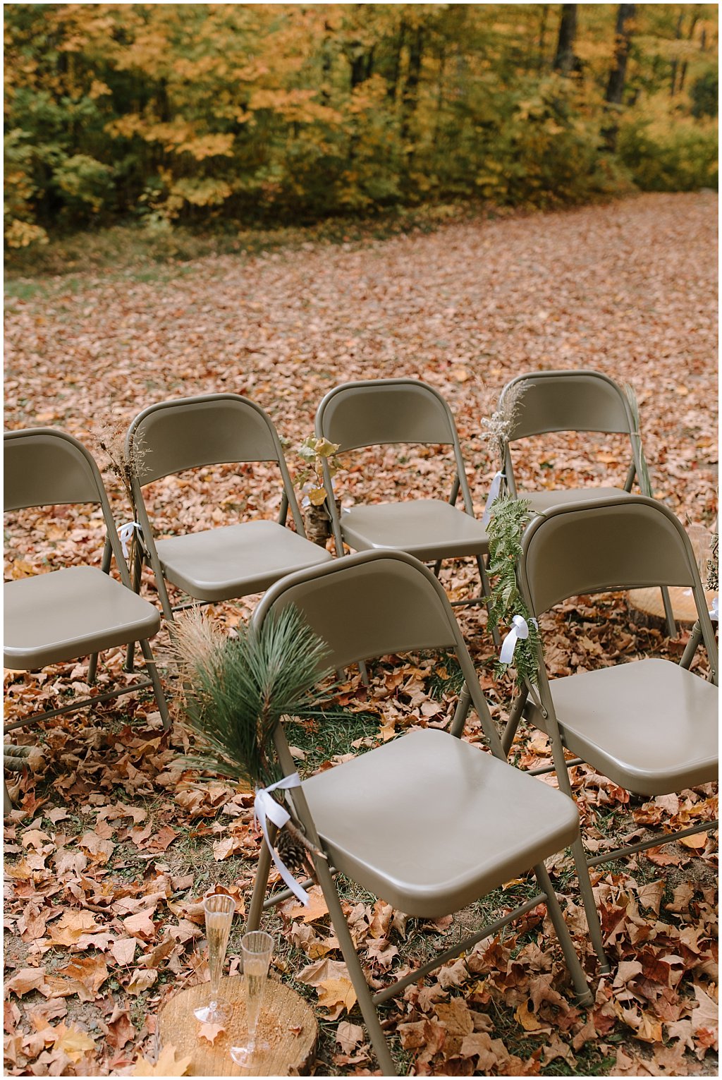 Foraged wedding decor on chairs - unique camp wedding inspiration in Northwoods of Wisconsin