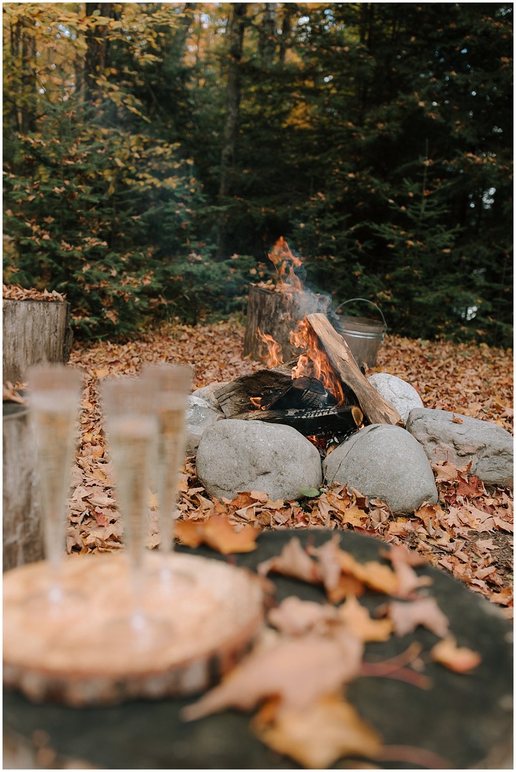 Campfire at wedding ceremony - fall - champagne - unique camp wedding inspiration in Northwoods of Wisconsin
