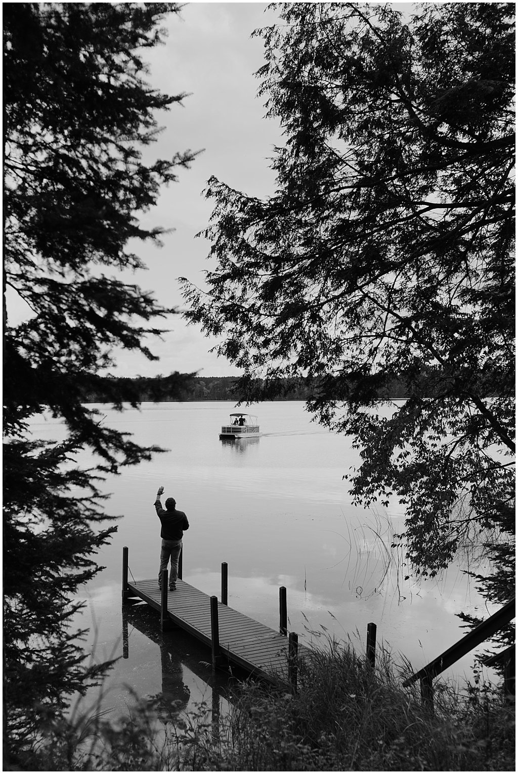 Lake camp wedding inspiration - couple arriving to ceremony by boat - Northwoods Wisconsin - Minocqua  -  unique camp wedding inspiration 