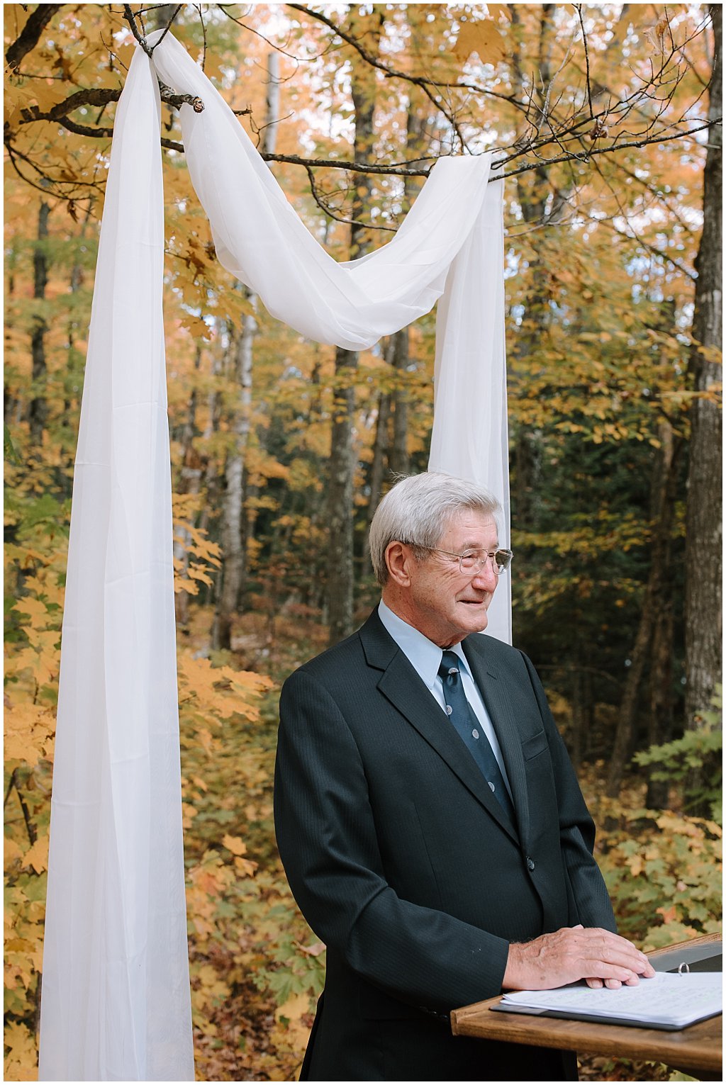 Grandfather of the groom officiating fall wedding