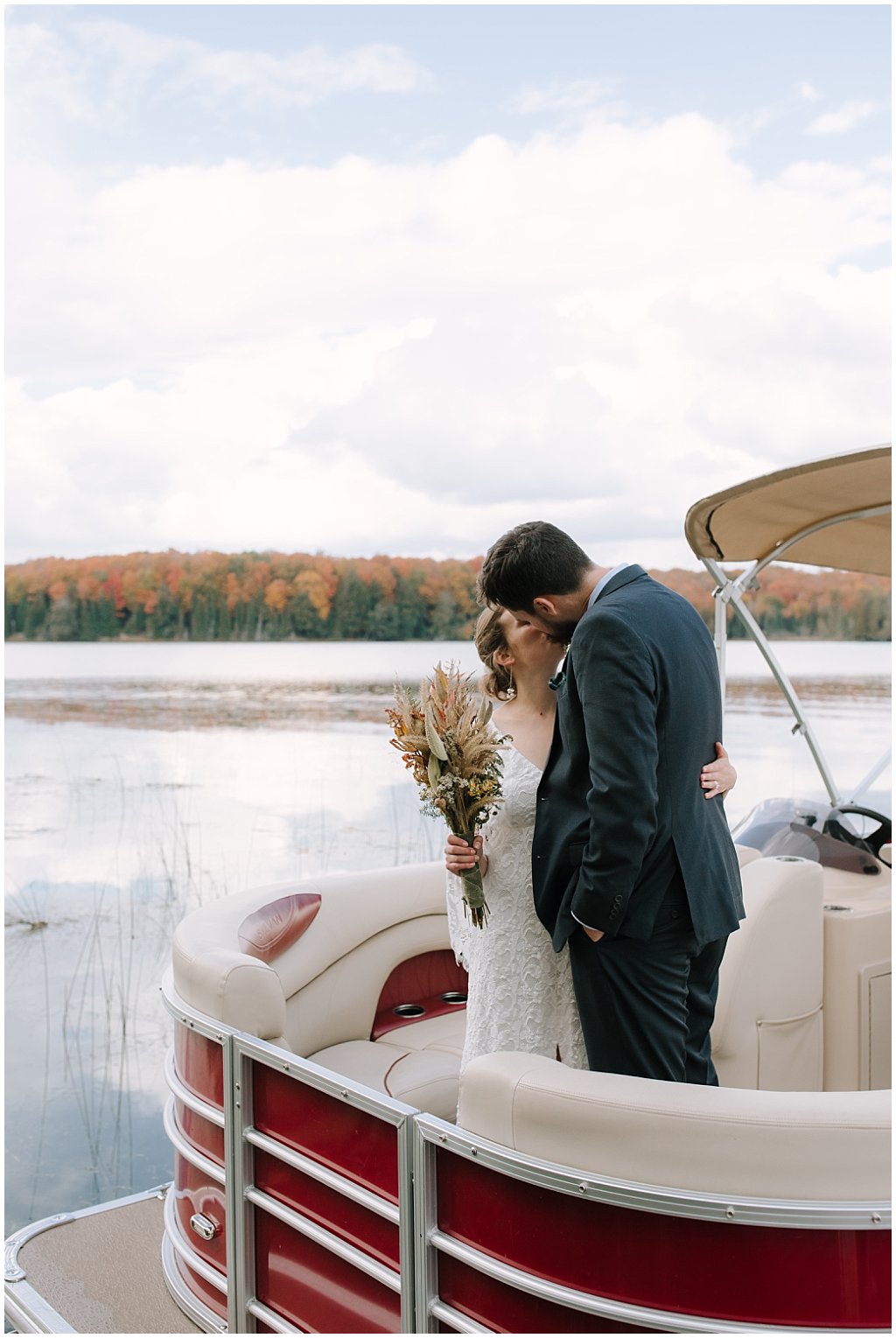 Couples wedding photos - unique camp wedding inspiration in Northwoods of Wisconsin on lake with boat