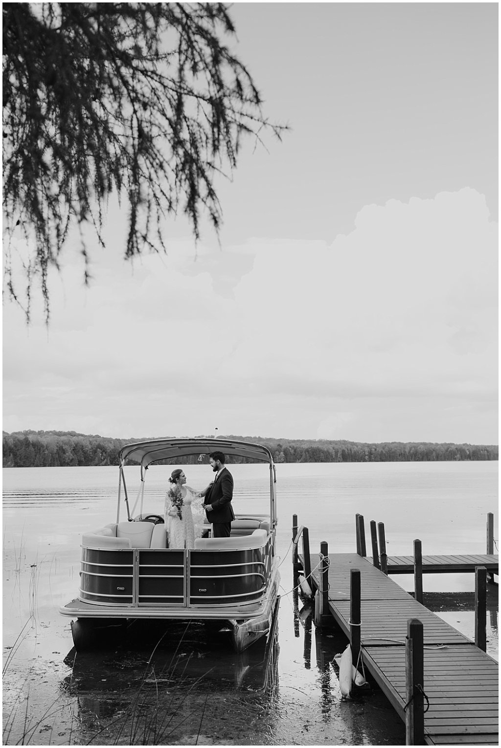 Couples wedding photos - unique camp wedding inspiration in Northwoods of Wisconsin on lake with boat