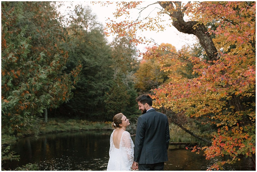 couples wedding pictures - unique camp wedding inspiration in Northwoods of Wisconsin on lake