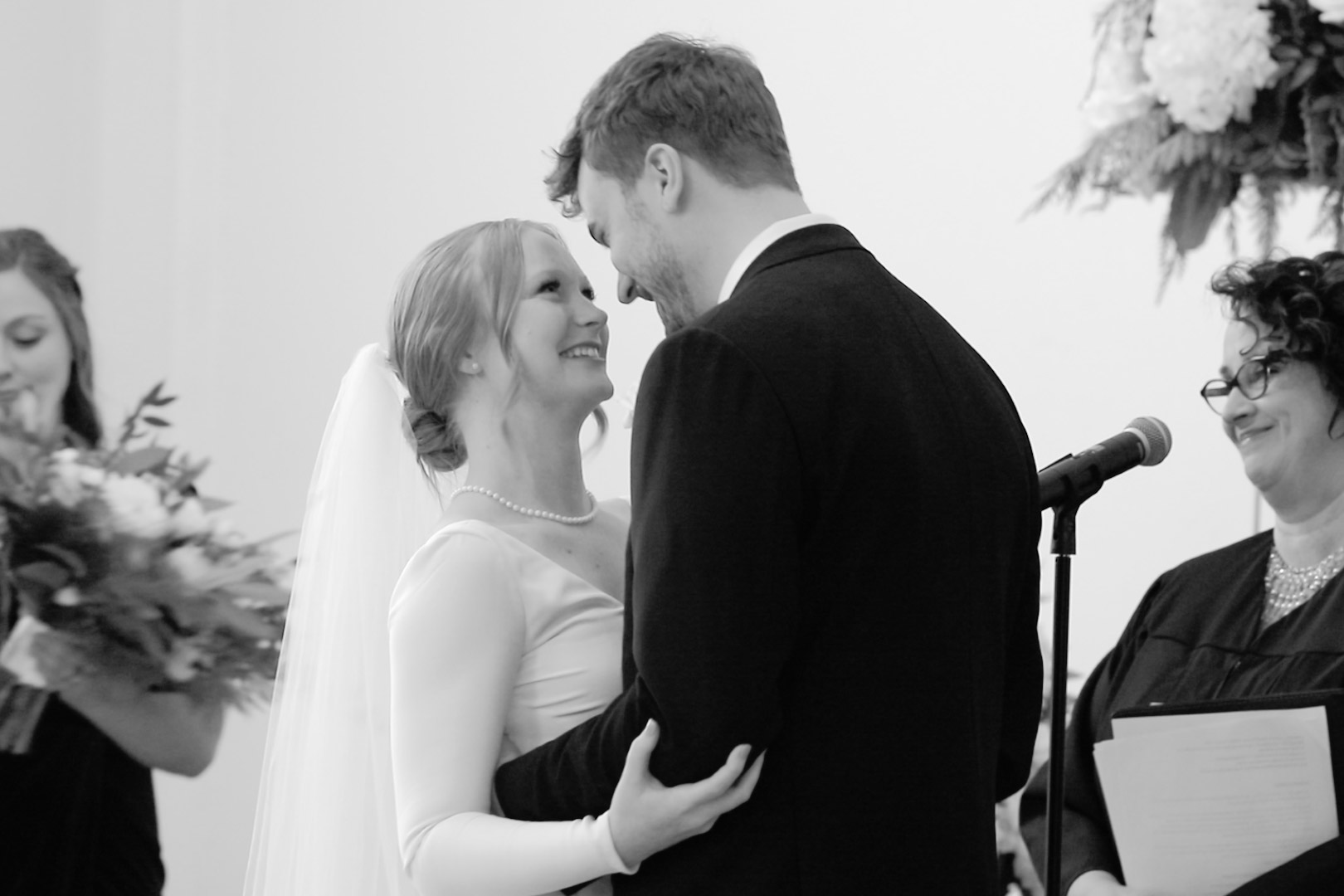 Young excited cute couple during wedding ceremony