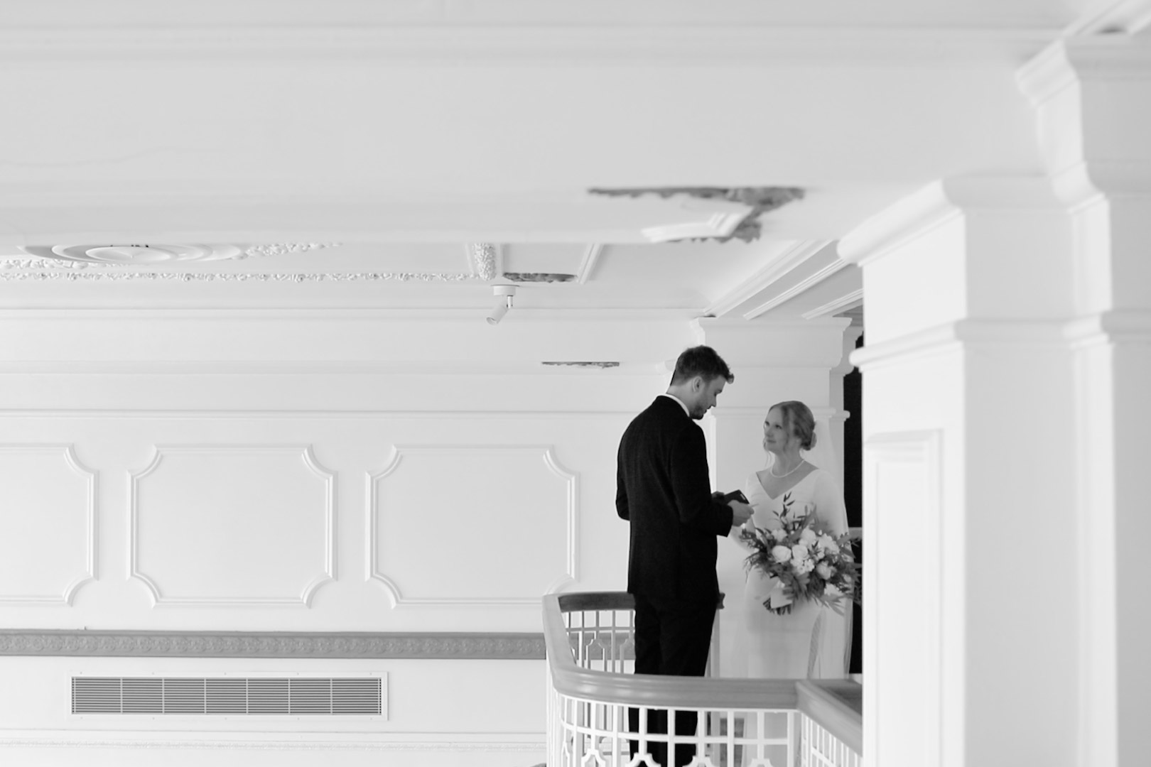 Bride and groom exchange vows at Hotel Northland before their wedding in Green Bay