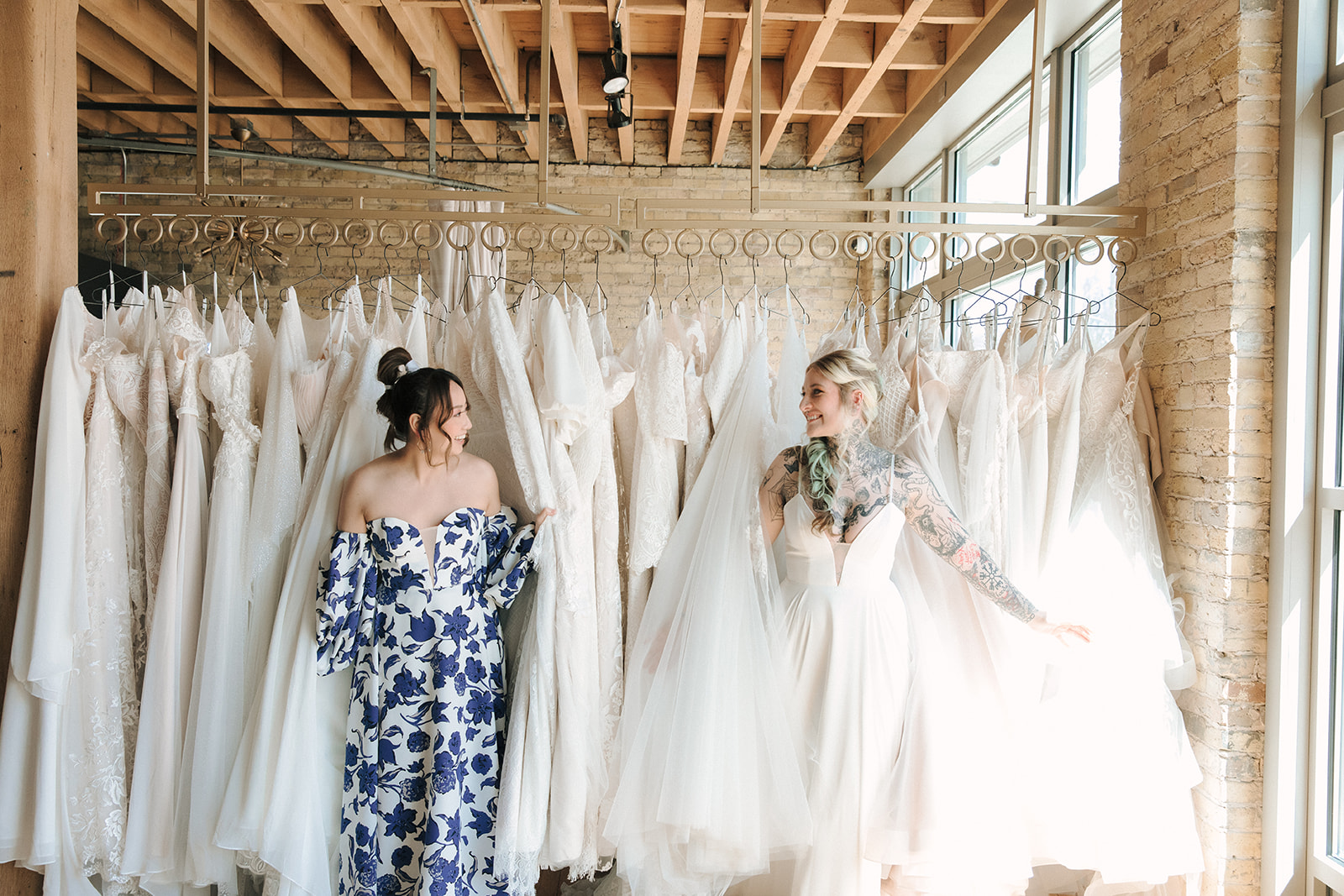 Playing in wedding dress shop - Striek Bridal Bar - Tara LaTour custom wedding gown with blue flowers