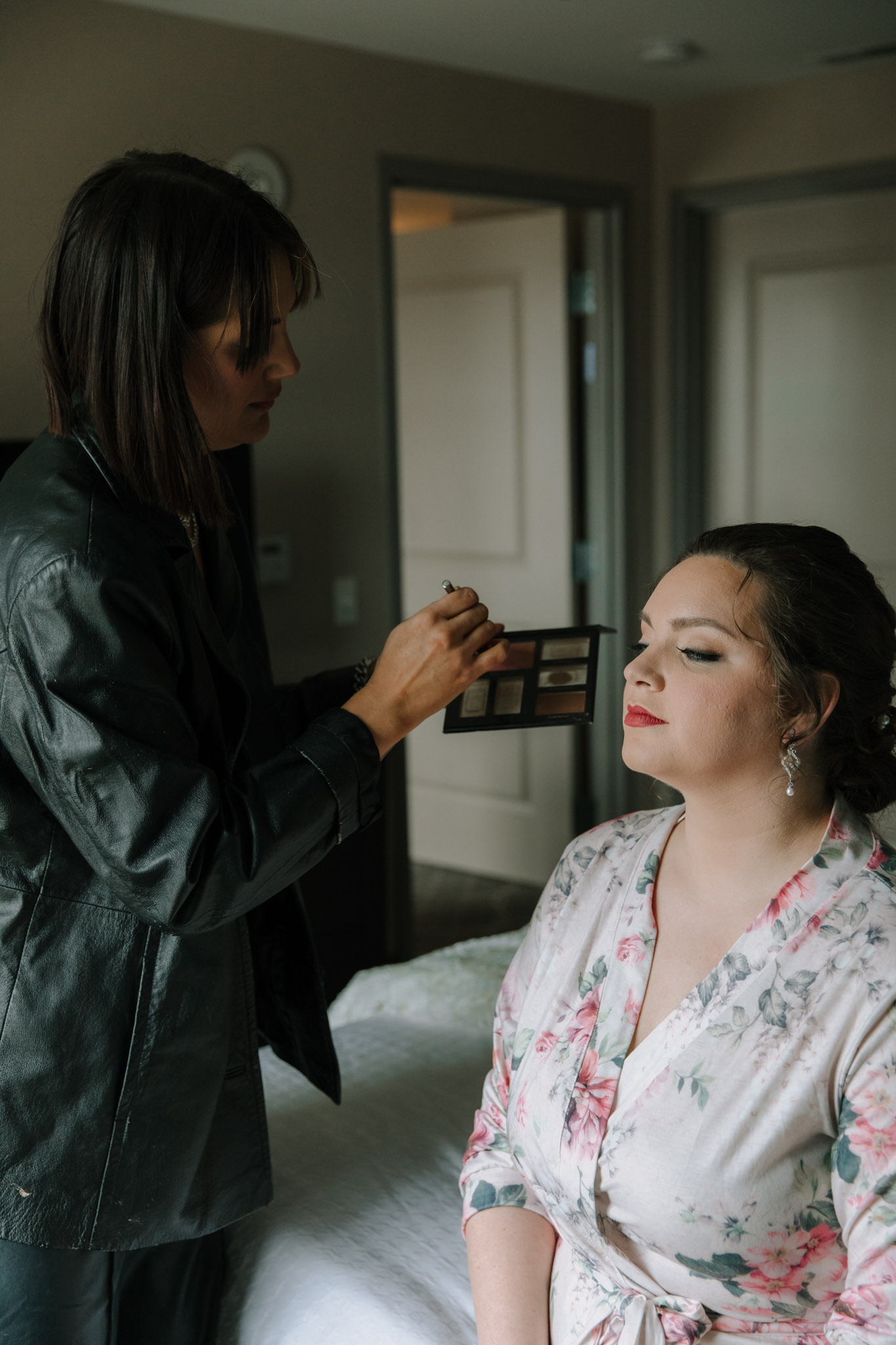 Calla Bogdanovich doing hair and makeup for Scottfree salon before St Stanislaus wedding - Hilton Homewood Suites - Wauwatosa