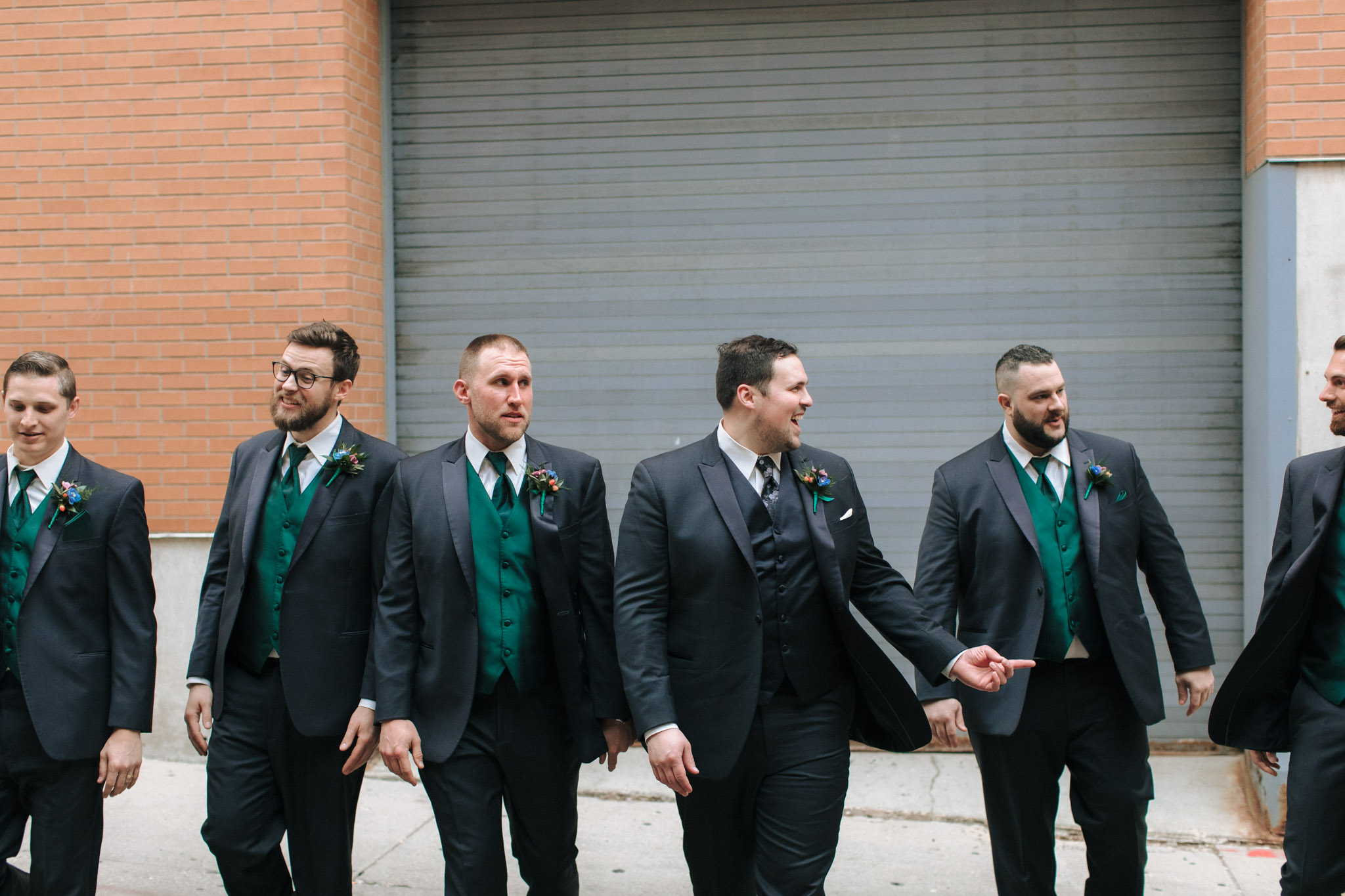 Groomsmen outside of Pabst Theatre for wedding pictures
