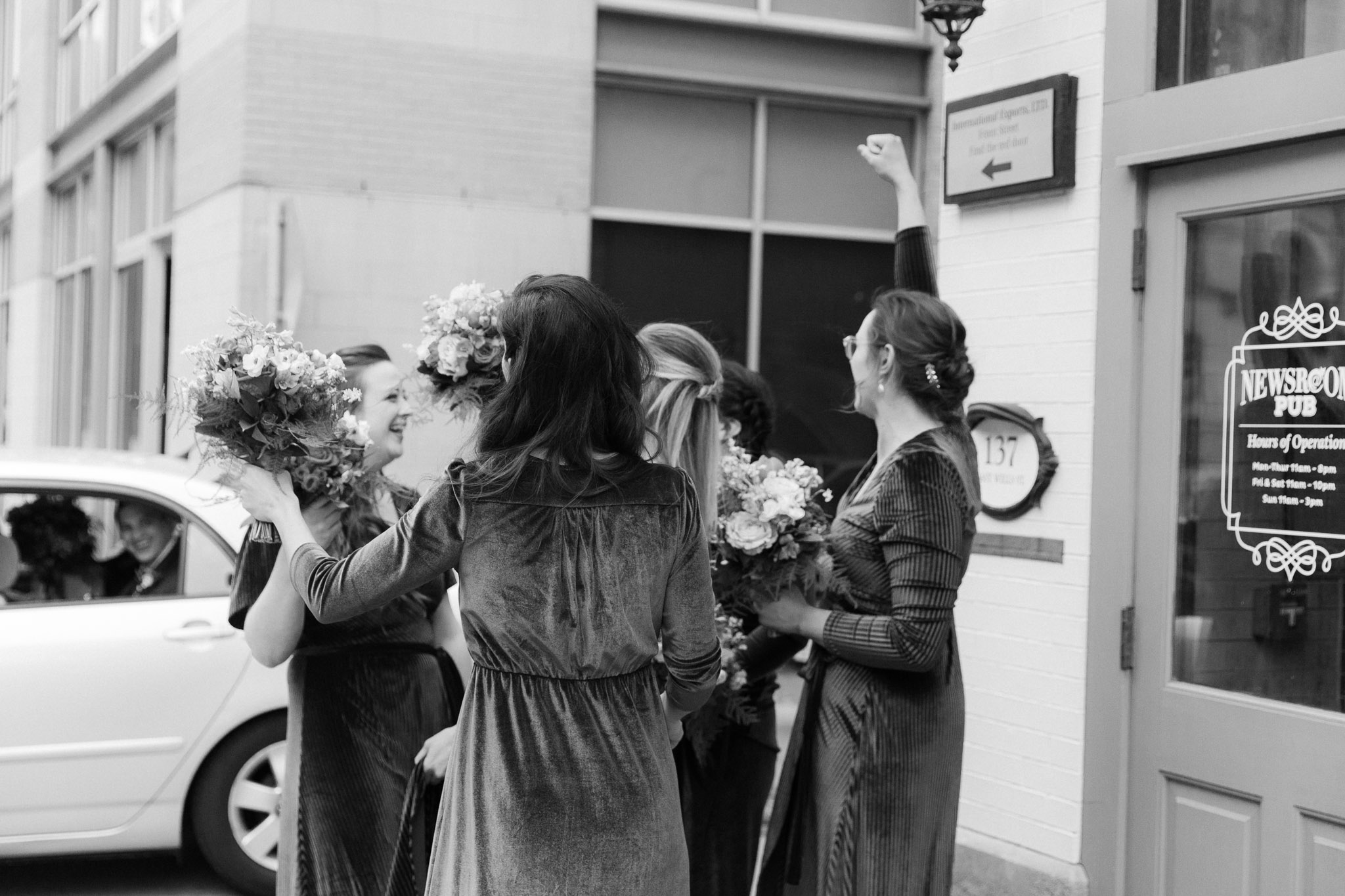 Wedding party  outside of Pabst Theatre for wedding pictures