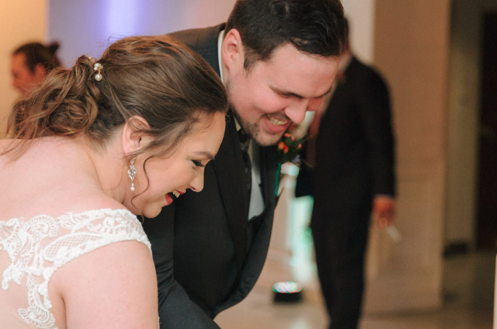 Bride and groom cutting cake at Sixth Floor Milwaukee
