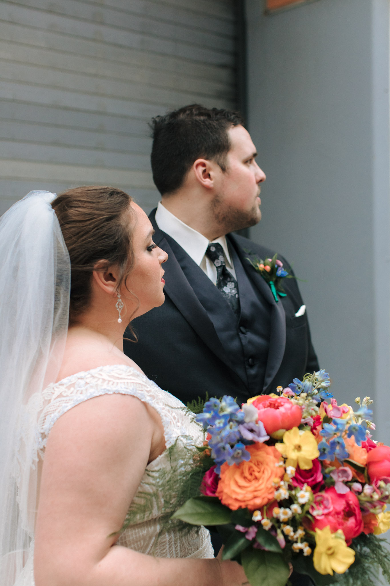 Bride and groom wedding pictures outside of Pabst Theatre