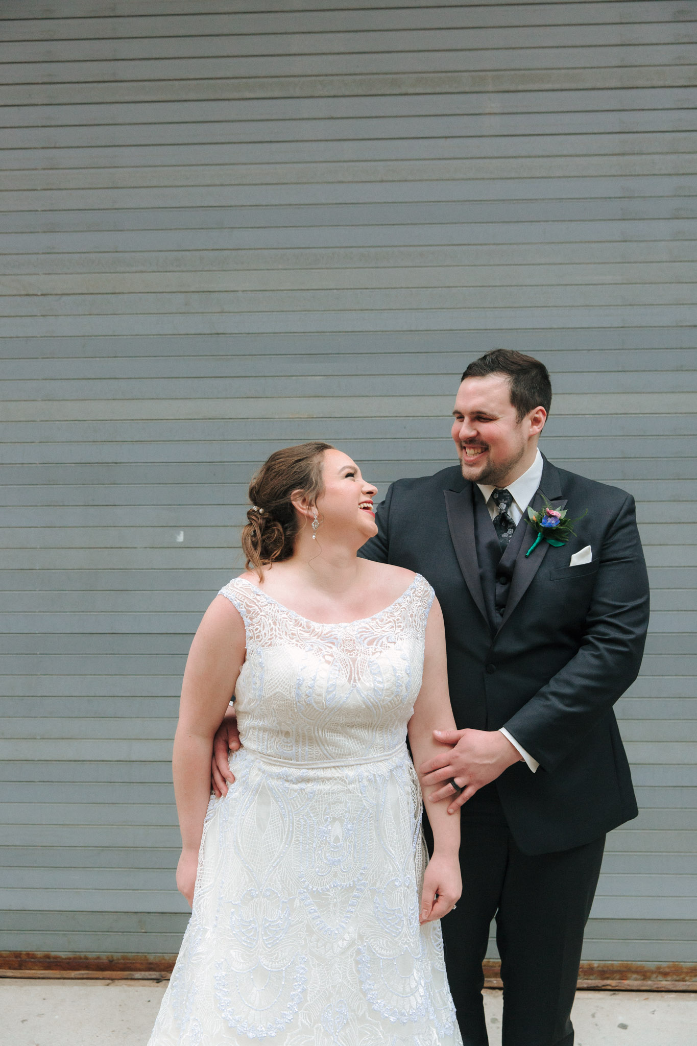 Bride and groom wedding pictures outside of Pabst Theatre