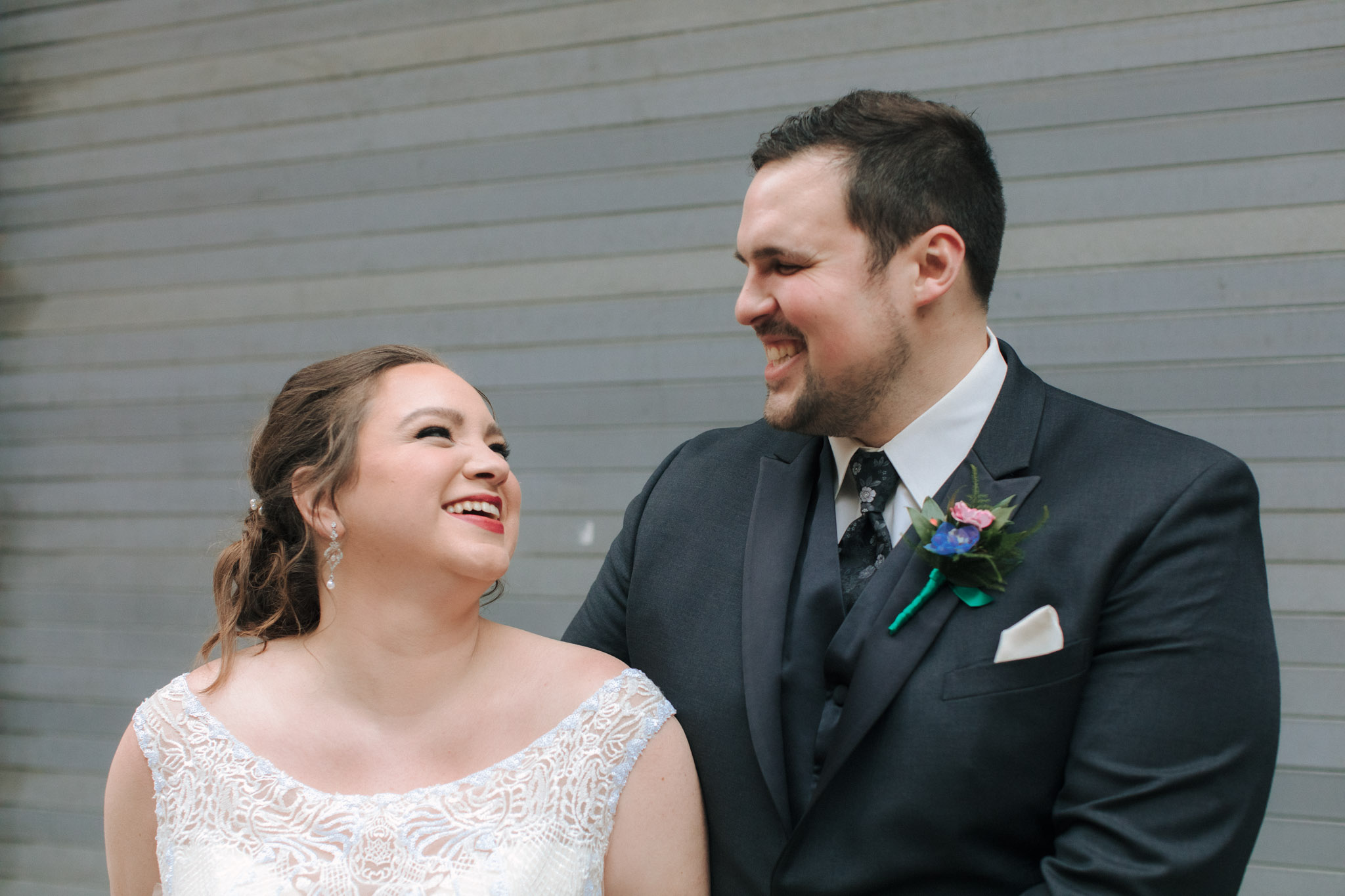 Bride and groom wedding pictures outside of Pabst Theatre