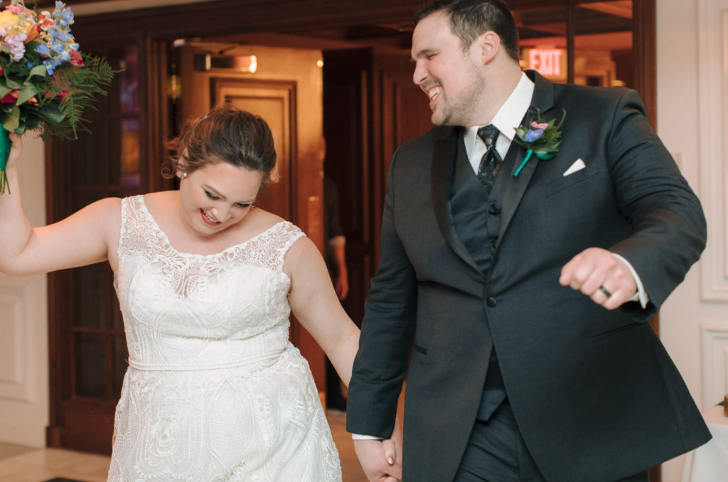 Bride and groom grand entrance - Sixth Floor Milwaukee