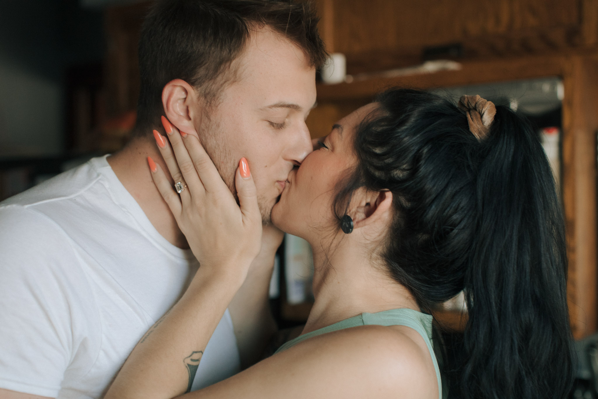 Couple kissing in the kitchen