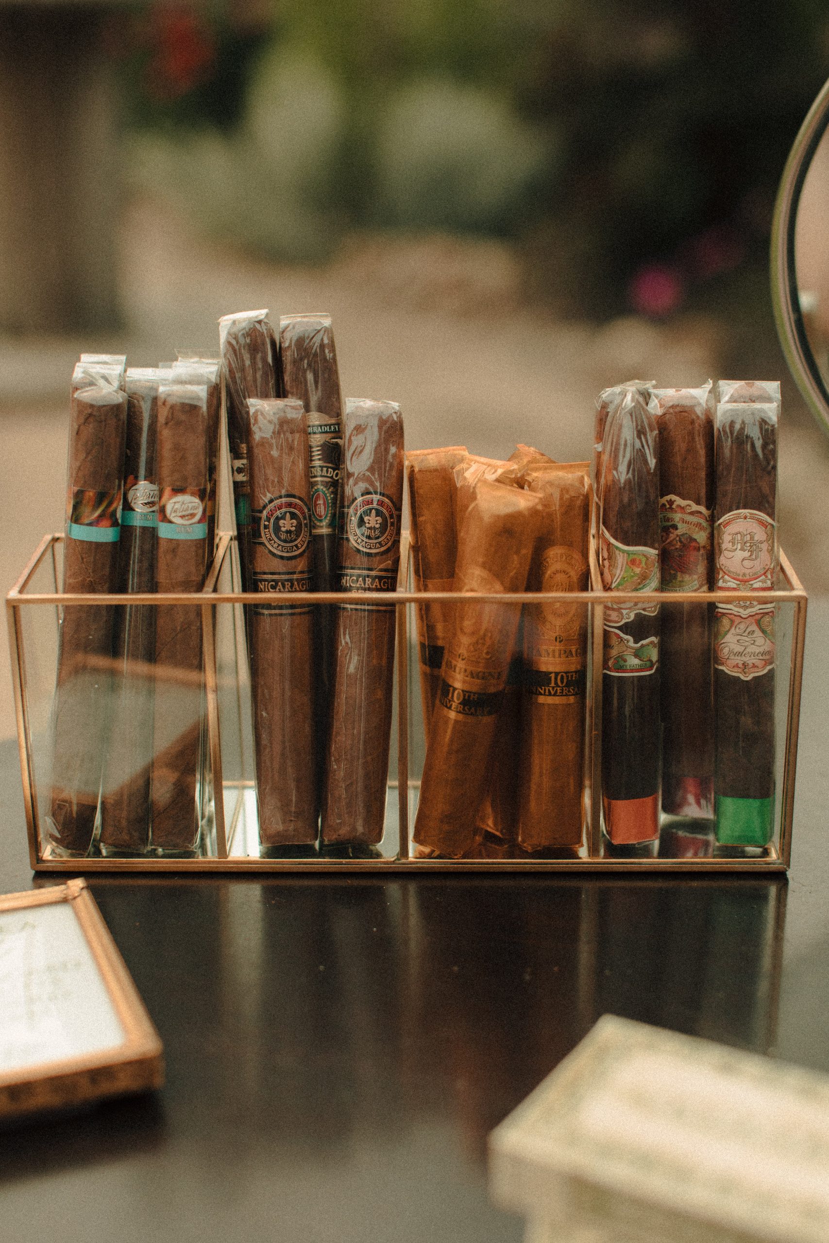 Speakeasy inspired cigar bar at a wedding with vintage lighters