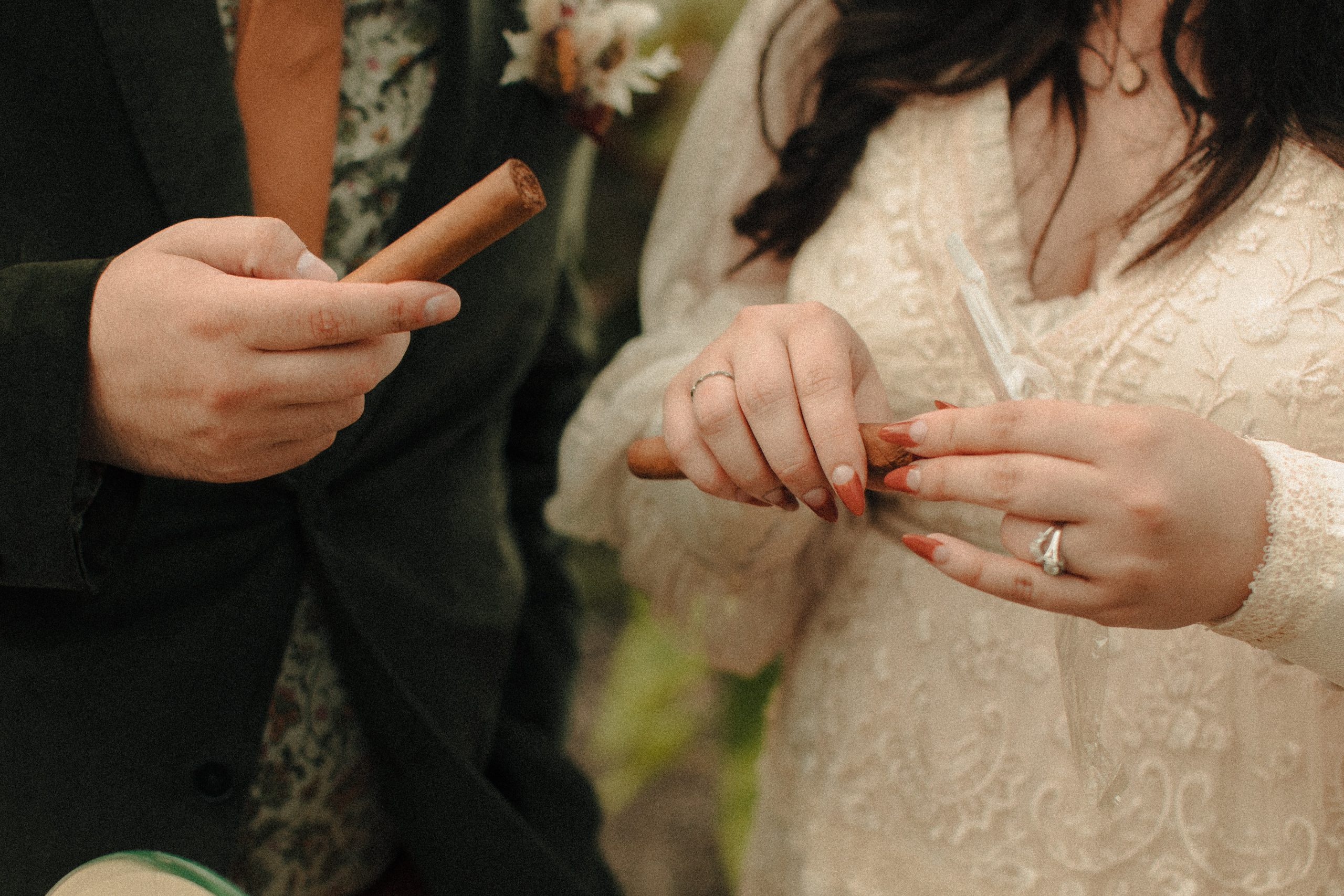 Speakeasy inspired cigar bar at a wedding with vintage lighters