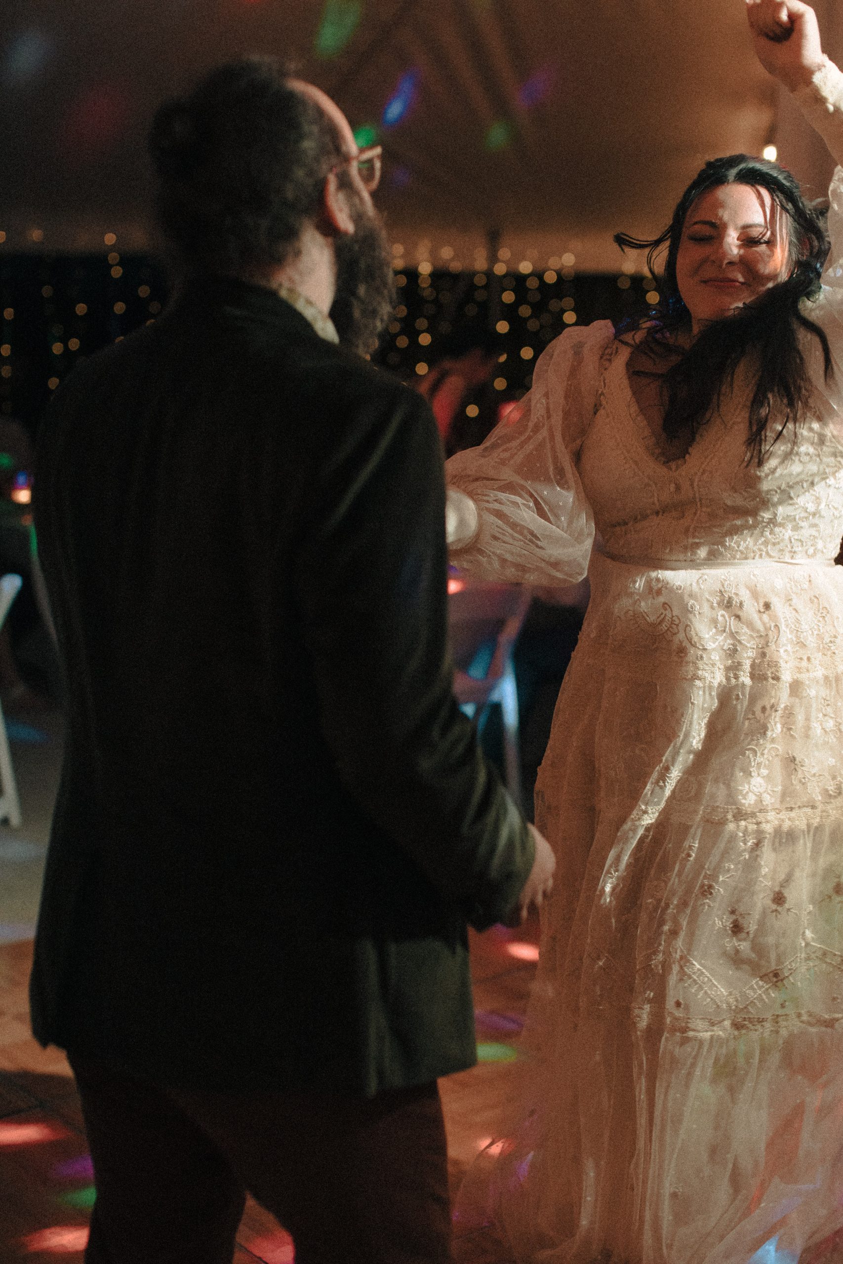 Bride and groom dancing to pop punk music